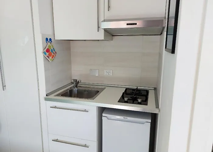 Апартаменты Onda Su Onda Секкело