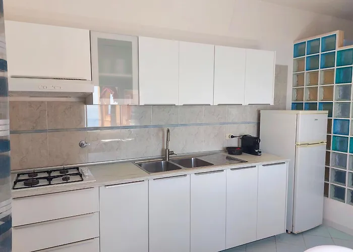 Апартаменты Onda Su Onda Секкело